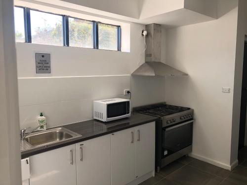 Köök või kööginurk majutusasutuses St Kilda Accommodation