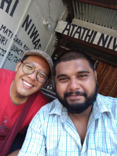a man and a woman posing for a picture at Atathi Niwas Guest House for Backpackers and Travellers in Siliguri
