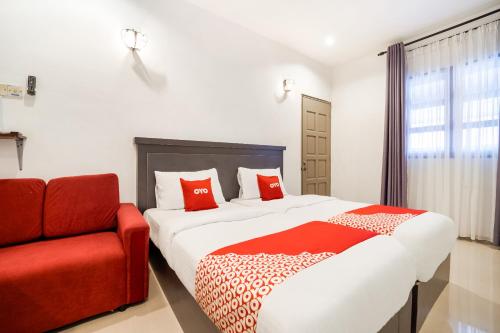 Letto o letti in una camera di Hotel O Kulim Inn