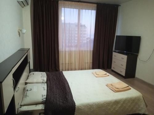
Кровать или кровати в номере Apartment on Prosveshcheniya 84
