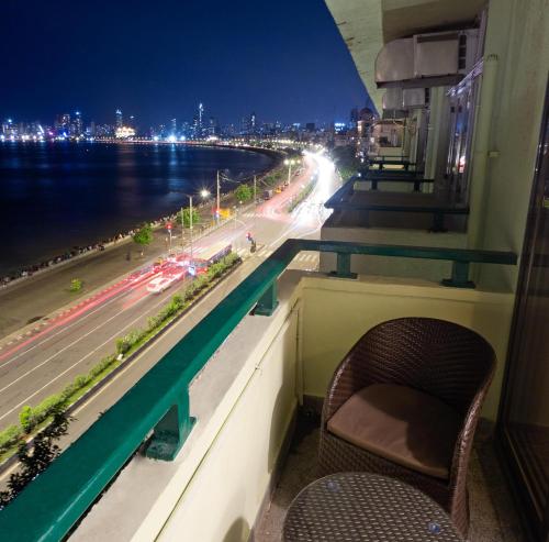 a room with a window with a view of a highway at Sea Green South Hotel in Mumbai