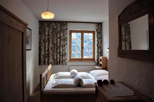 Posteľ alebo postele v izbe v ubytovaní Vier Jahreszeiten