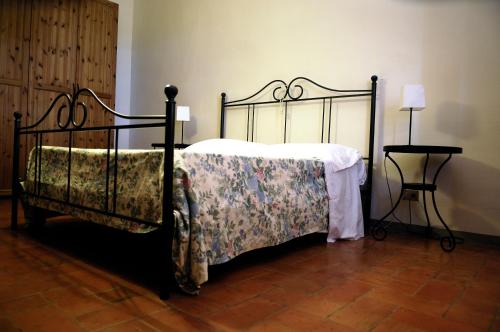 En eller flere senge i et værelse på Agriturismo Il Sole Verde