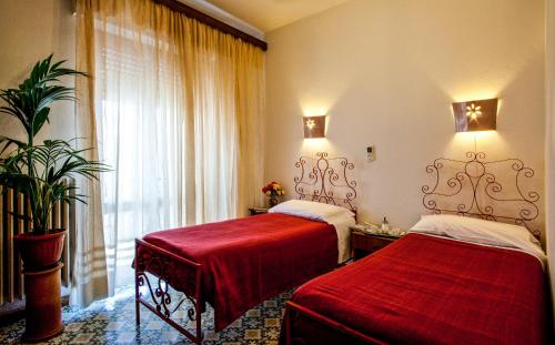 サッロクにあるHotel Villarosa con Vespa Rentのギャラリーの写真