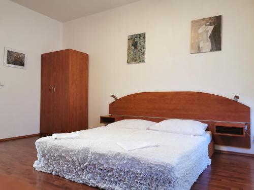 Łóżko lub łóżka w pokoju w obiekcie Apartment Amandment