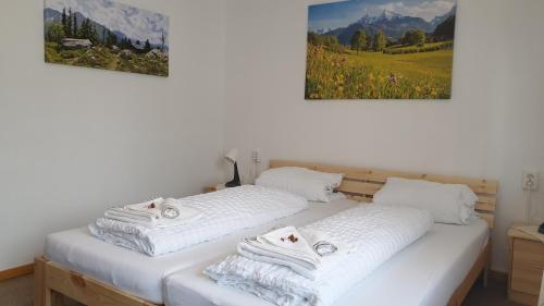 Gulta vai gultas numurā naktsmītnē Alpina Apartments - Zell am See