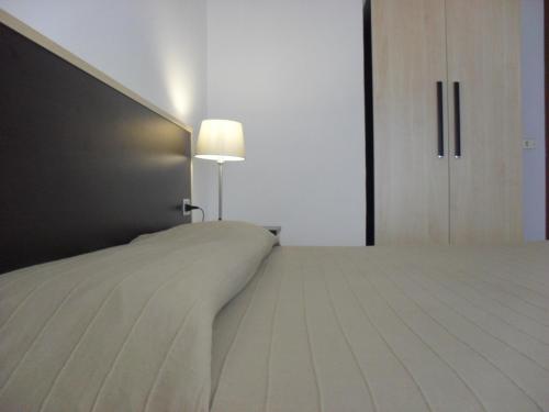Postel nebo postele na pokoji v ubytování Hotel Solemar