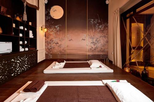 a room with a bed on the floor in a room at Premier Palace Hotel Kyiv in Kyiv