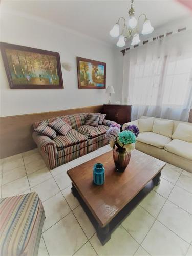 Uma área de estar em Hotel Vista Hermosa 17