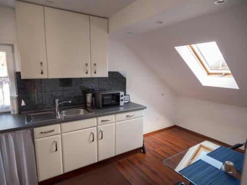 Dapur atau dapur kecil di Ferienwohnung Moemlingtal