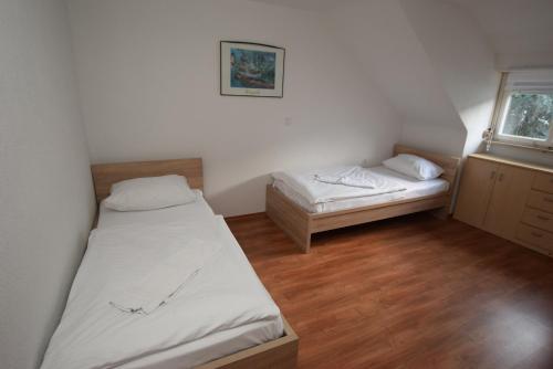 Postel nebo postele na pokoji v ubytování AB Apartment 06