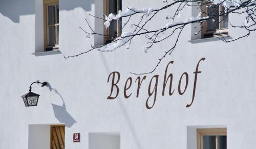 a white building with a sign that reads berberot at Berghof Niederthai in Niederthai