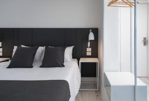 Ένα ή περισσότερα κρεβάτια σε δωμάτιο στο Palacio Paz Boutique Hotel
