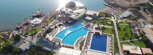 an aerial view of a resort with a swimming pool at Lords Palace Hotel SPA Casino in Kyrenia