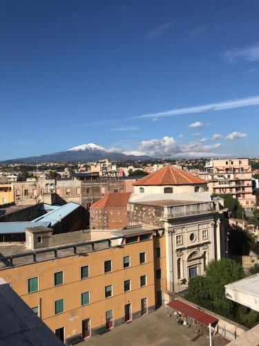 a view of a city from the roof of a building at Residenza Parco Gioeni in Catania