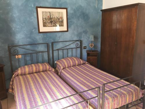 Postel nebo postele na pokoji v ubytování Il Biancospino