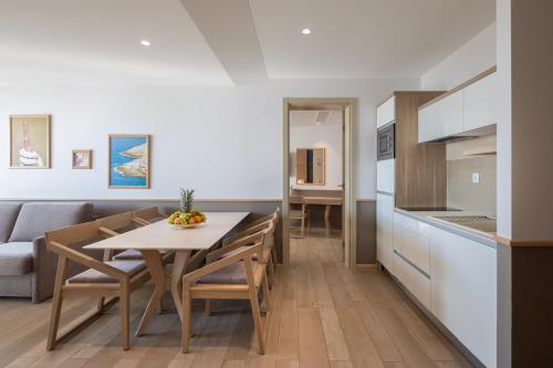 Kuchyň nebo kuchyňský kout v ubytování Hotel Tamaris