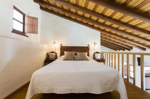 Postel nebo postele na pokoji v ubytování Casas da Capela do Monte, Country Houses