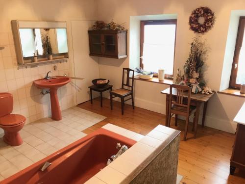 Ванна кімната в Maison Zielinger