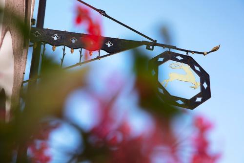 a reflection of the world in a piece of wire with flowers at Hotel Restaurant Zum Hirschen in Donaueschingen
