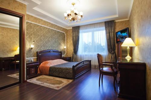 Postel nebo postele na pokoji v ubytování Hotel Helicopter