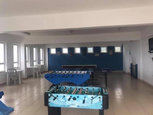 a room with four tables with birds on them at Penthouse With Breathtaking Panoramic Views of Mediterranean sea and Mountain in Akanthou