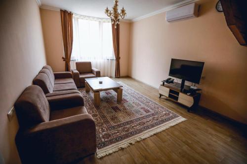 Μια τηλεόραση ή/και κέντρο ψυχαγωγίας στο AlmaBagi Hotel&Villas