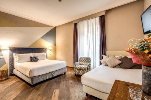 Postel nebo postele na pokoji v ubytování Boutique Hotel Galatea