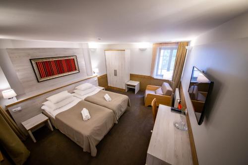 Hotel Liiliaにあるベッド
