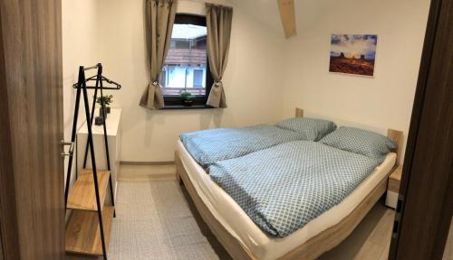Postel nebo postele na pokoji v ubytování Tále Apartmán 9, Lúčnica, Chopok juh