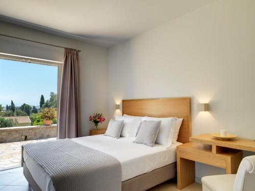 Ένα ή περισσότερα κρεβάτια σε δωμάτιο στο VILLA CANDELA