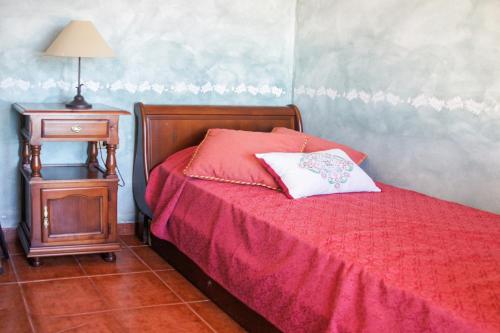 Ένα ή περισσότερα κρεβάτια σε δωμάτιο στο Casa Las Riquelas
