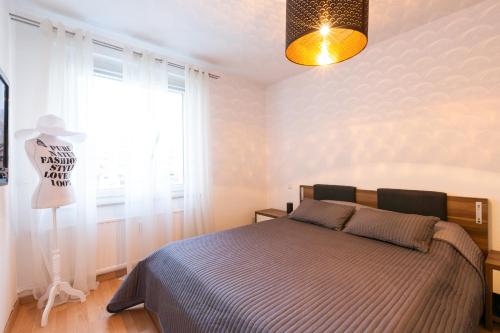 Cama o camas de una habitación en Deutsche Messe Zimmer - Private Apartments Hannover Exhibition Center (room agency)