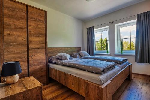 Posteľ alebo postele v izbe v ubytovaní Na Rozcestí Frýdlant