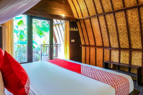 A bed or beds in a room at Nelly homestay