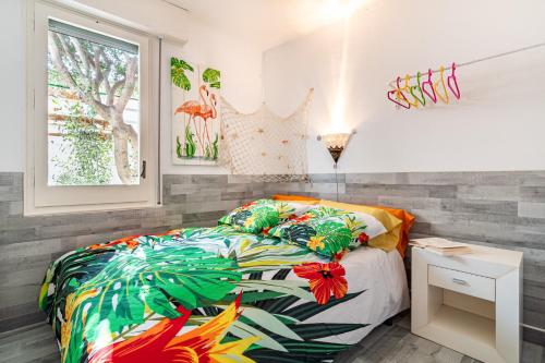A bed or beds in a room at CASA FLAMINGO