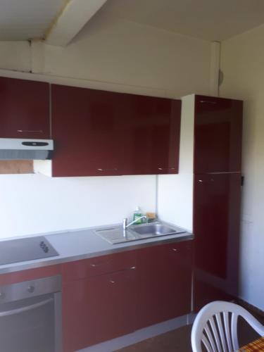a kitchen with a sink and a counter top at STUDIO FACE MARINA in Saint-François