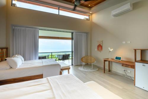 Postel nebo postele na pokoji v ubytování Lapazul Boutique Hotel