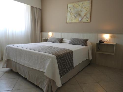 Postel nebo postele na pokoji v ubytování Hotel Binder Quality Inn