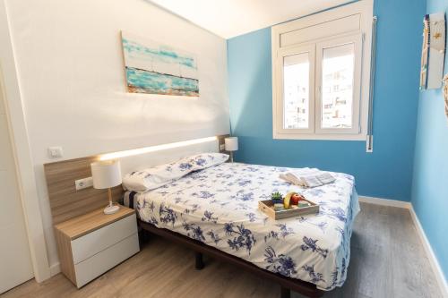 A bed or beds in a room at Tarrapolita_Rambla
