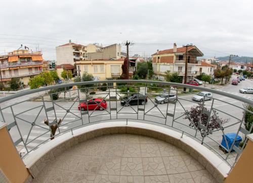 a balcony with a view of a parking lot at Vier Luxury House in Serres
