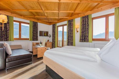 Un pat sau paturi într-o cameră la Hettlerhof