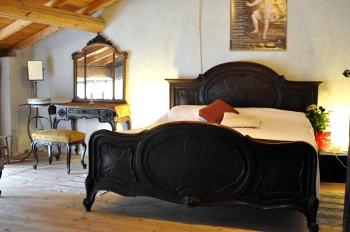 Postel nebo postele na pokoji v ubytování Agriturismo Olivazzi