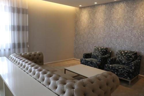 Zona de estar de Afrin Prestige Hotel