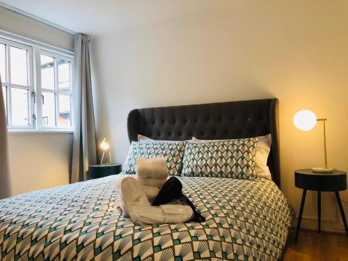 מיטה או מיטות בחדר ב-La casetta d’Àneu, Oxford Castle