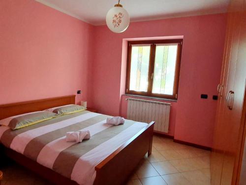 Ένα ή περισσότερα κρεβάτια σε δωμάτιο στο Casa Clef