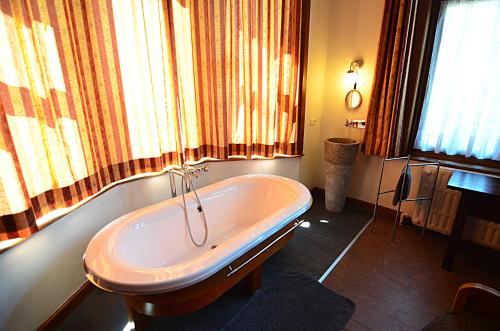 Kylpyhuone majoituspaikassa La Citadine
