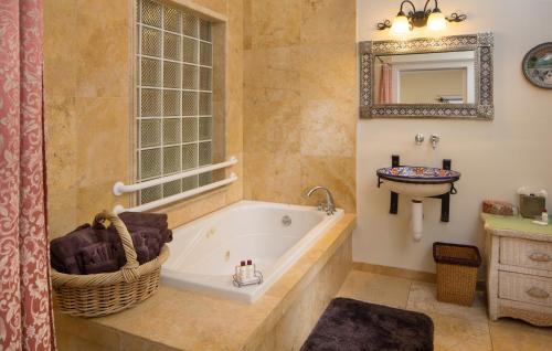 A bathroom at Casa Blanca Inn and Suites