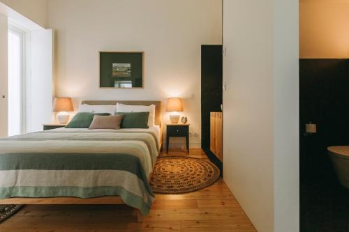 Un ou plusieurs lits dans un hébergement de l'établissement Ventozelo Hotel & Quinta