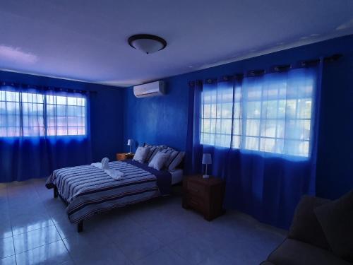 Ένα ή περισσότερα κρεβάτια σε δωμάτιο στο Hostal Villa Mayte Coronado